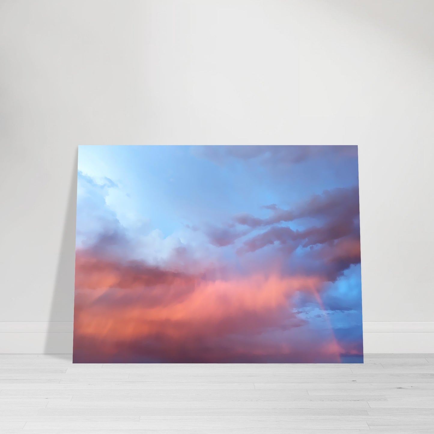 Photographic print capturing a breathtaking, colorful stormy dark blue sky adorned with hues of maroon, orange and pink clouds, taken in Marfa Texas by Allison Cartwright , Found Art Studio.