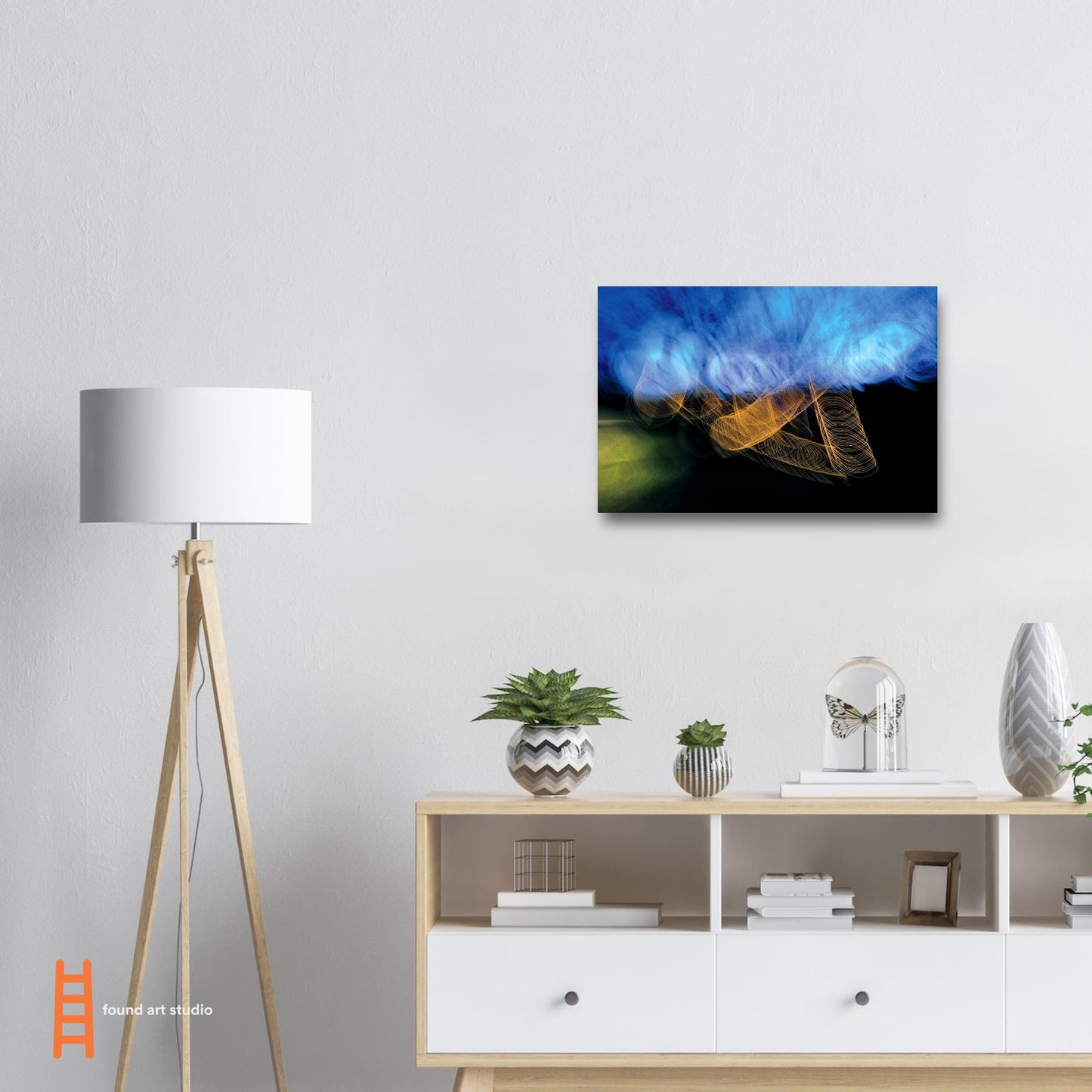 Abstract Photographic Print showcasing mesmerizing swirls of vibrant colors resembling a cosmic dance in colors of orange, black, and shades of blue by Allison Cartwright of Found Art Studio