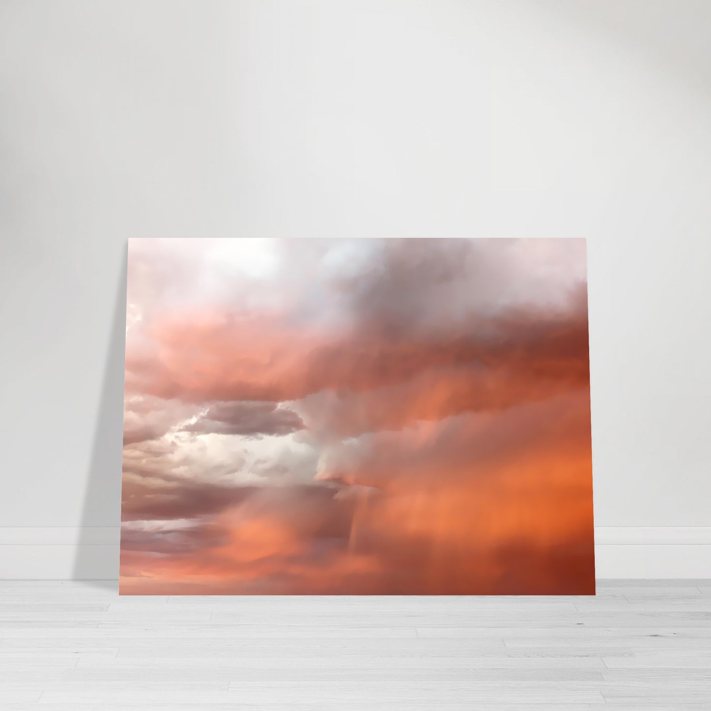 Photographic print capturing a breathtaking, colorful stormy sky adorned with hues of red, orange, pink, and golden clouds, taken in Marfa Texas by Allison Cartwright , Found Art Studio.