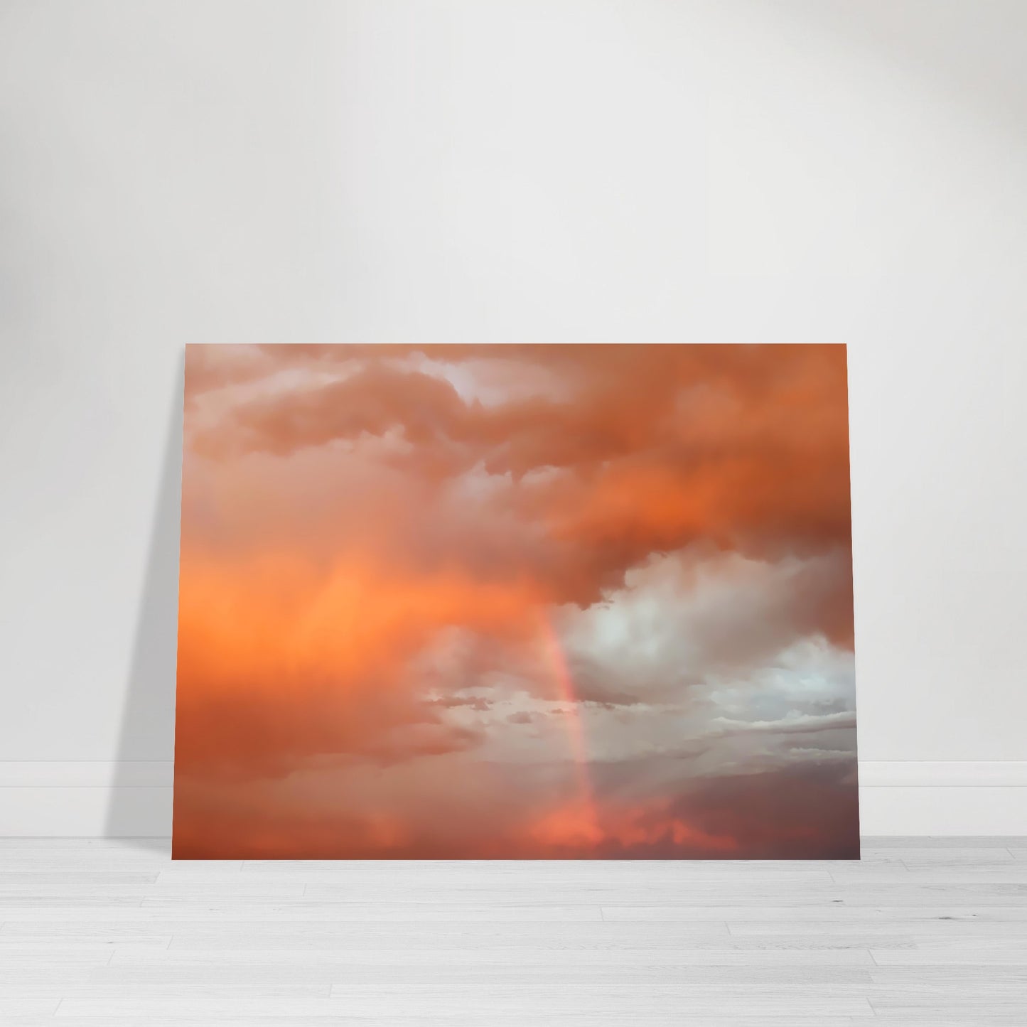 Photographic print capturing a breathtaking, colorful stormy sky adorned with hues of red, orange, pink, and golden clouds, taken in Marfa Texas by Allison Cartwright , Found Art Studio.