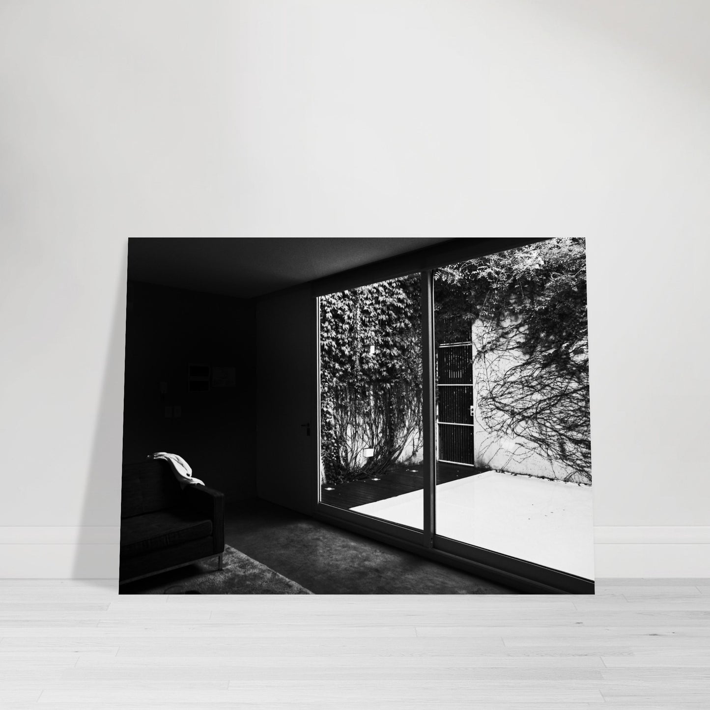 Photographic Print of a Dramatic Black and White Chair facing a Courtyard  Scene by Allison Cartwright Found Art Studio